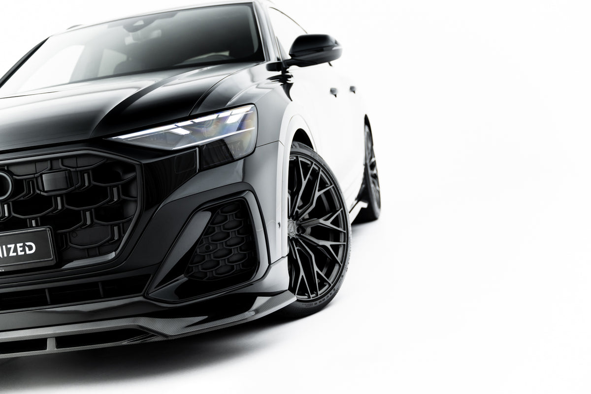 Detaljbilde av Carbon Uniform Shape-finish på Audi SQ8 frontsplitter