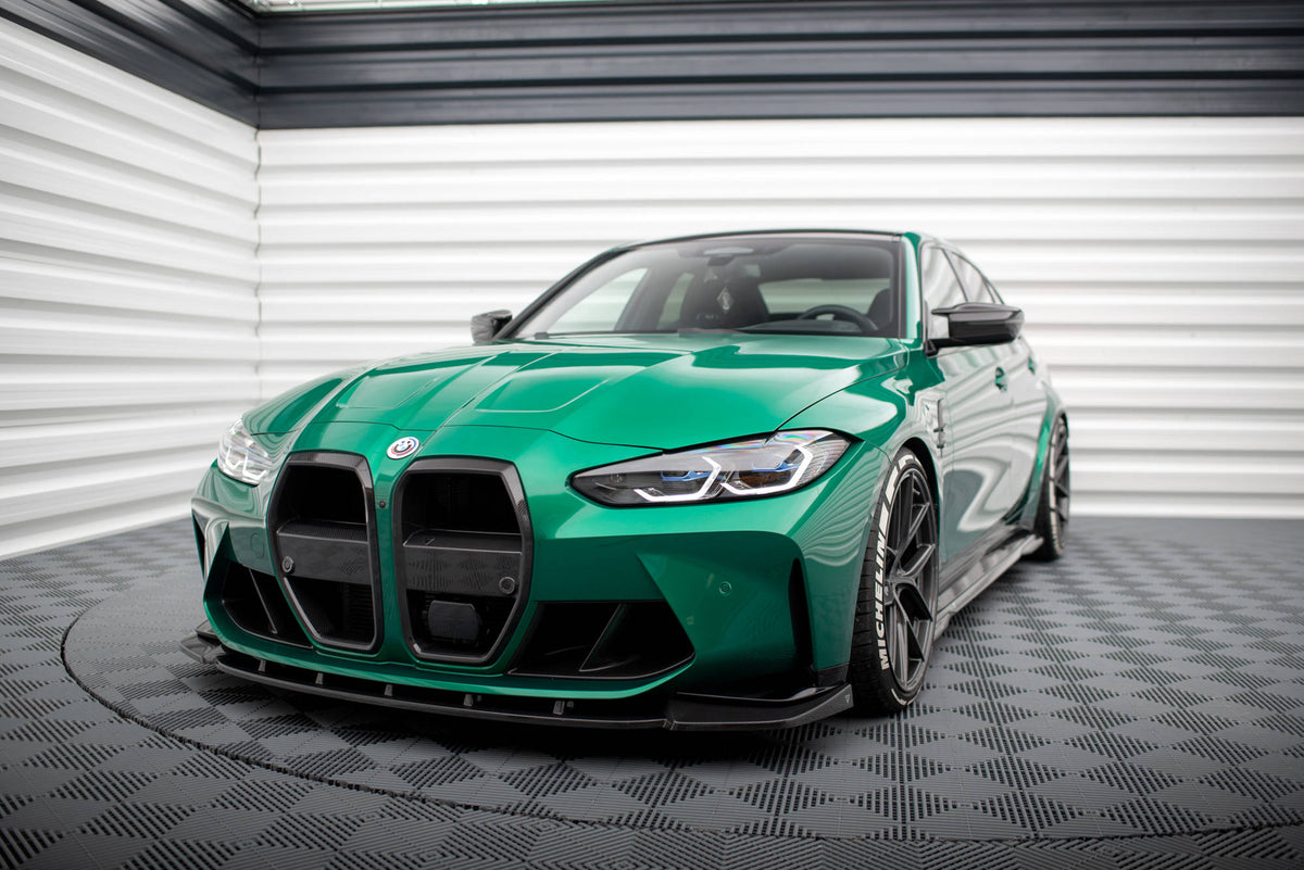 Nærbilde av karbonvev på frontsplitter for BMW M3 Touring G81