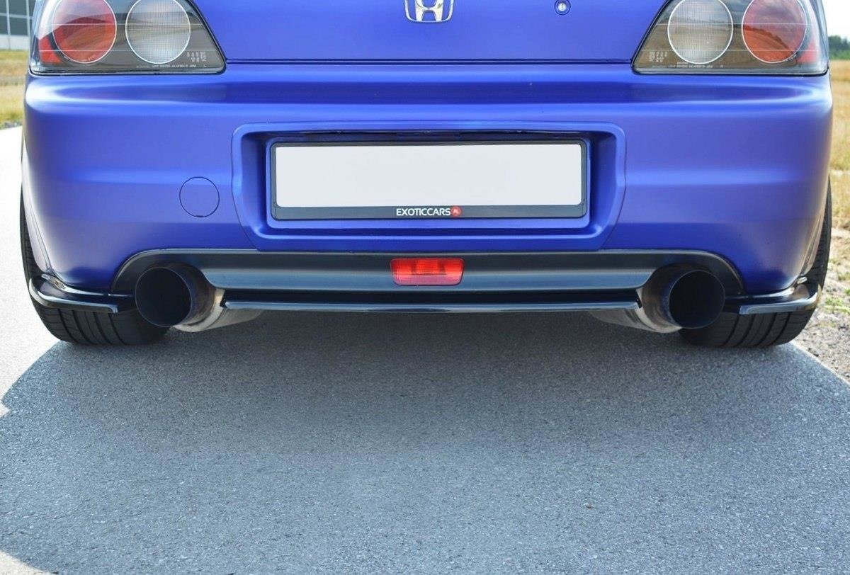 Nærbilde av sideflap bak for Honda S2000 med teksturert sort overflate