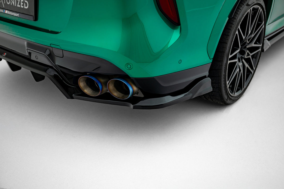 Detalj av ABS-overflaten på baksplitteren til BMW X6 M F96