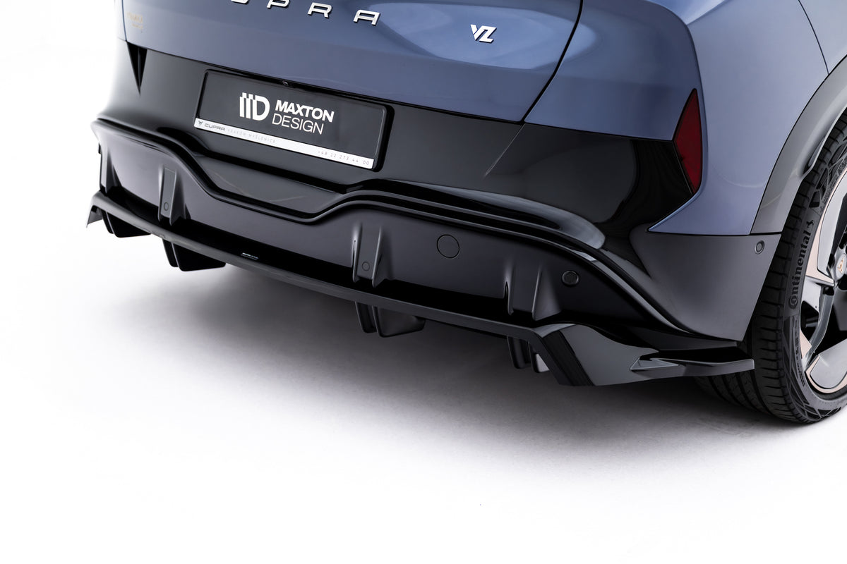 Detaljbilde av ABS-overflaten på baksplitter til Cupra Tavascan Mk1