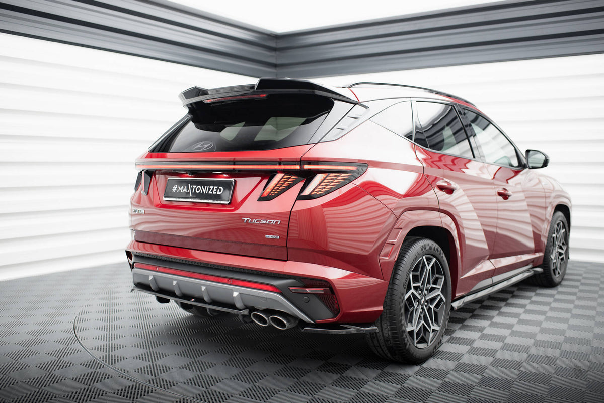 Bakre diffuser til Hyundai Tucson N-Line MK4 i strukturert sort finish, sett ovenfra