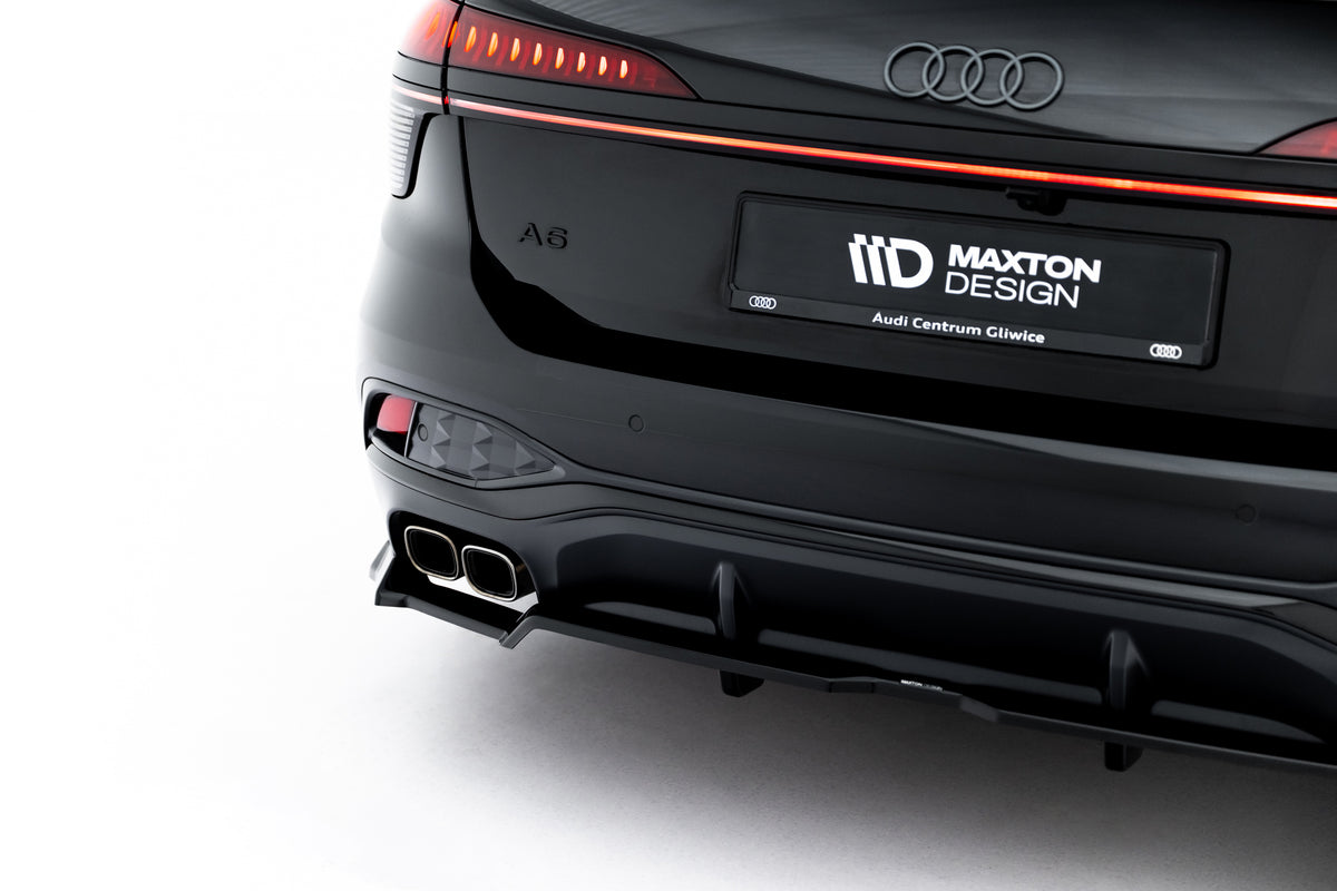 Detaljbilde av blank sort overflate på baksplitter til Audi A6 C9
