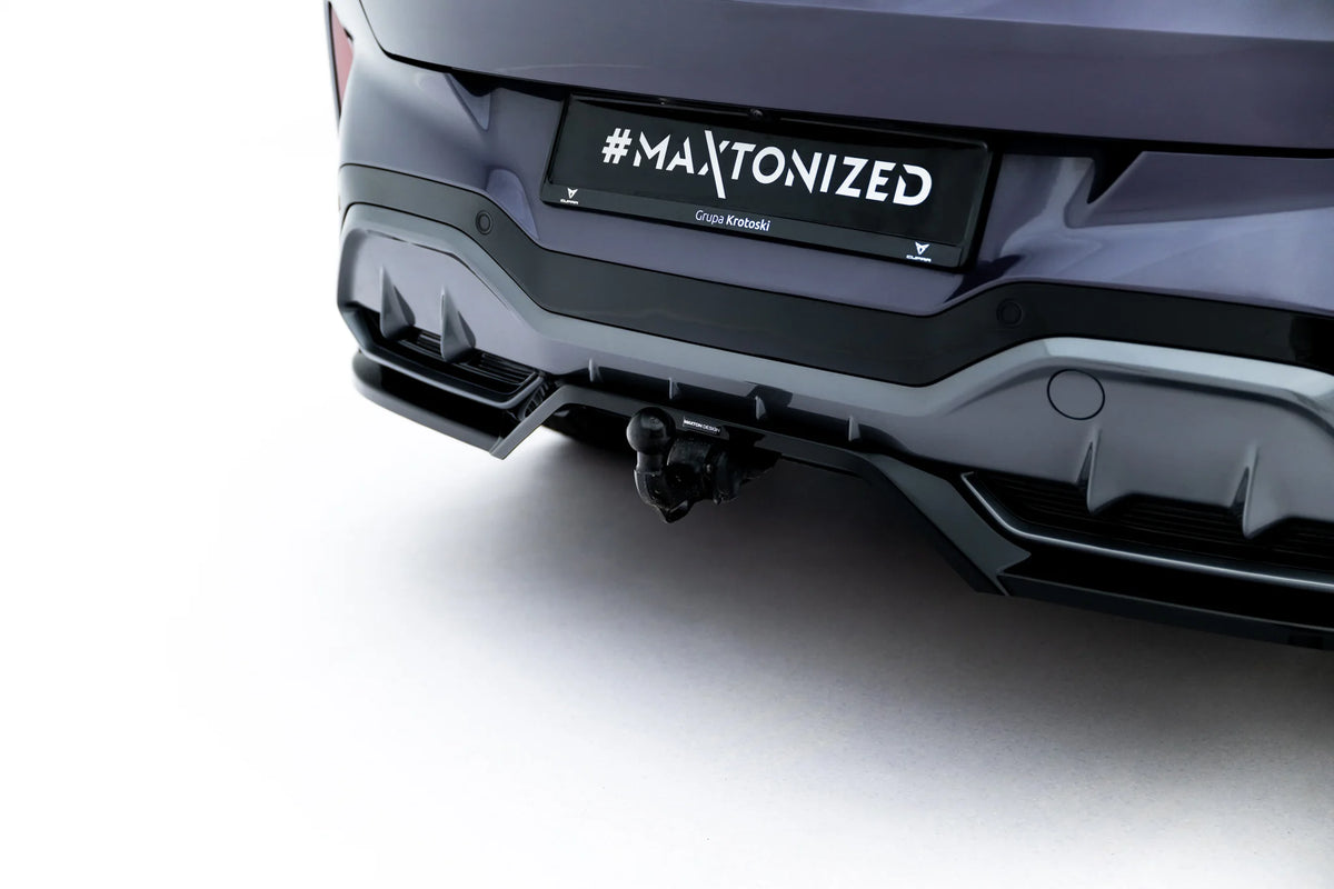 Detaljbilde av ABS-overflate på hekksplitter til Cupra Terramar Mk1