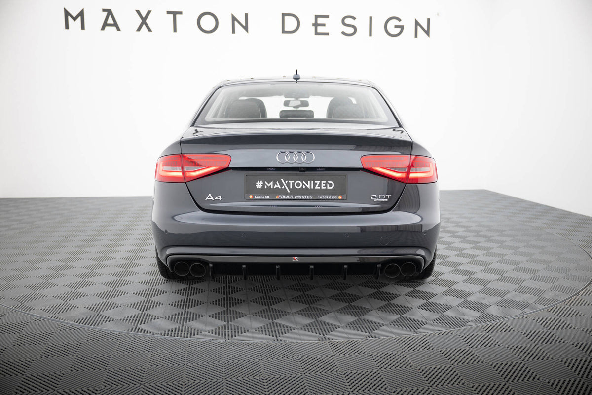Nærbilde av bakdiffuser for Audi A4 B8 Facelift med strukturert sort overflate