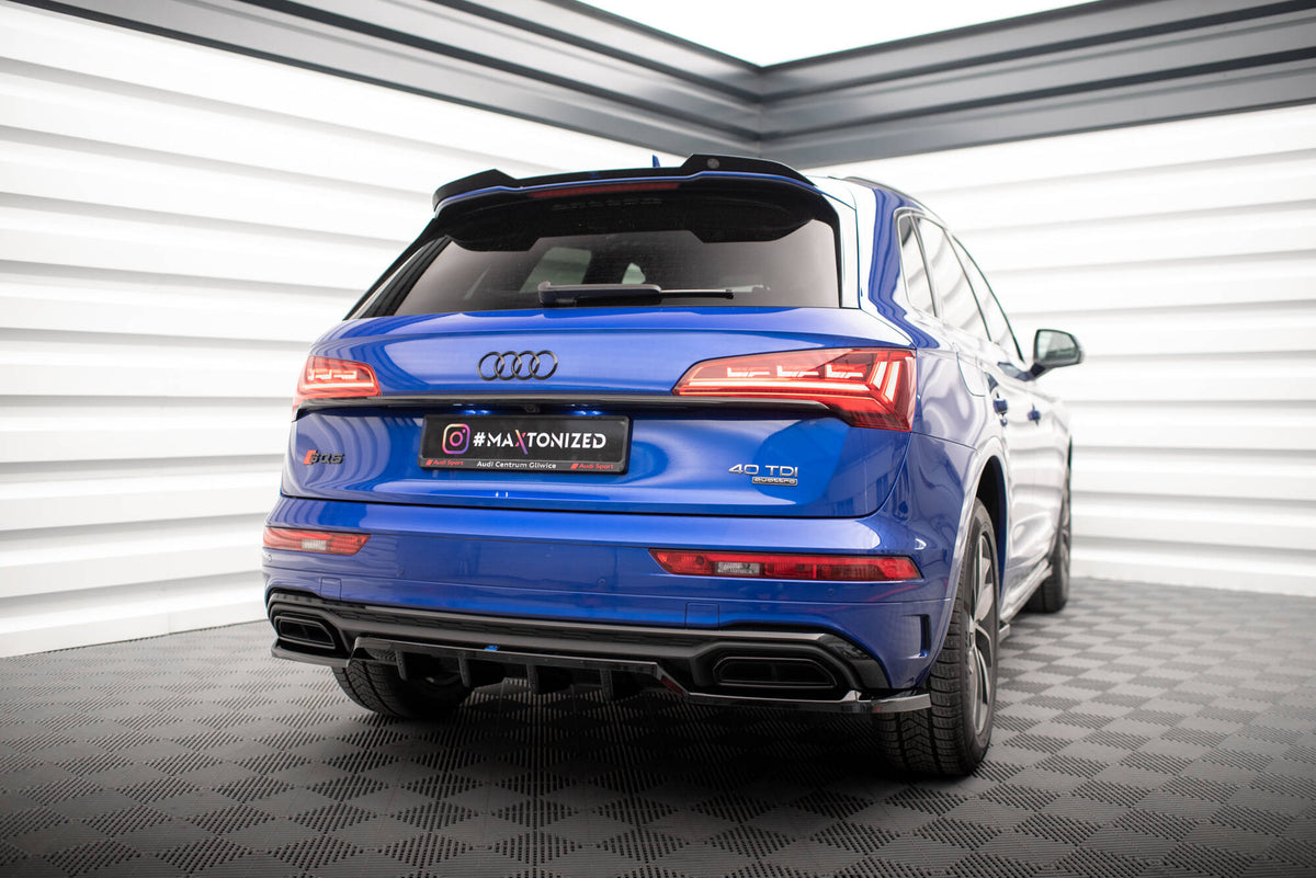 Sideskjørt diffusor for Audi Q5 S-Line i nærbilde, strukturert svart ABS-overflate