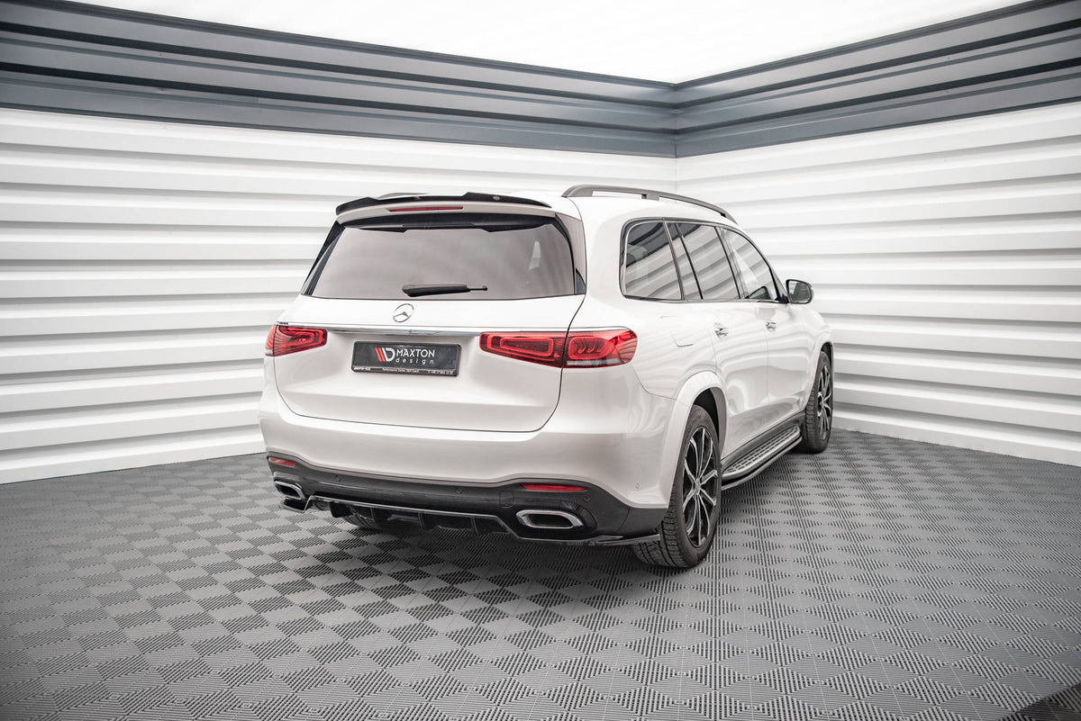 Nærbilde av overflaten på splittersett i blankt sort ABS-plast til Mercedes GLS X167 AMG-Line