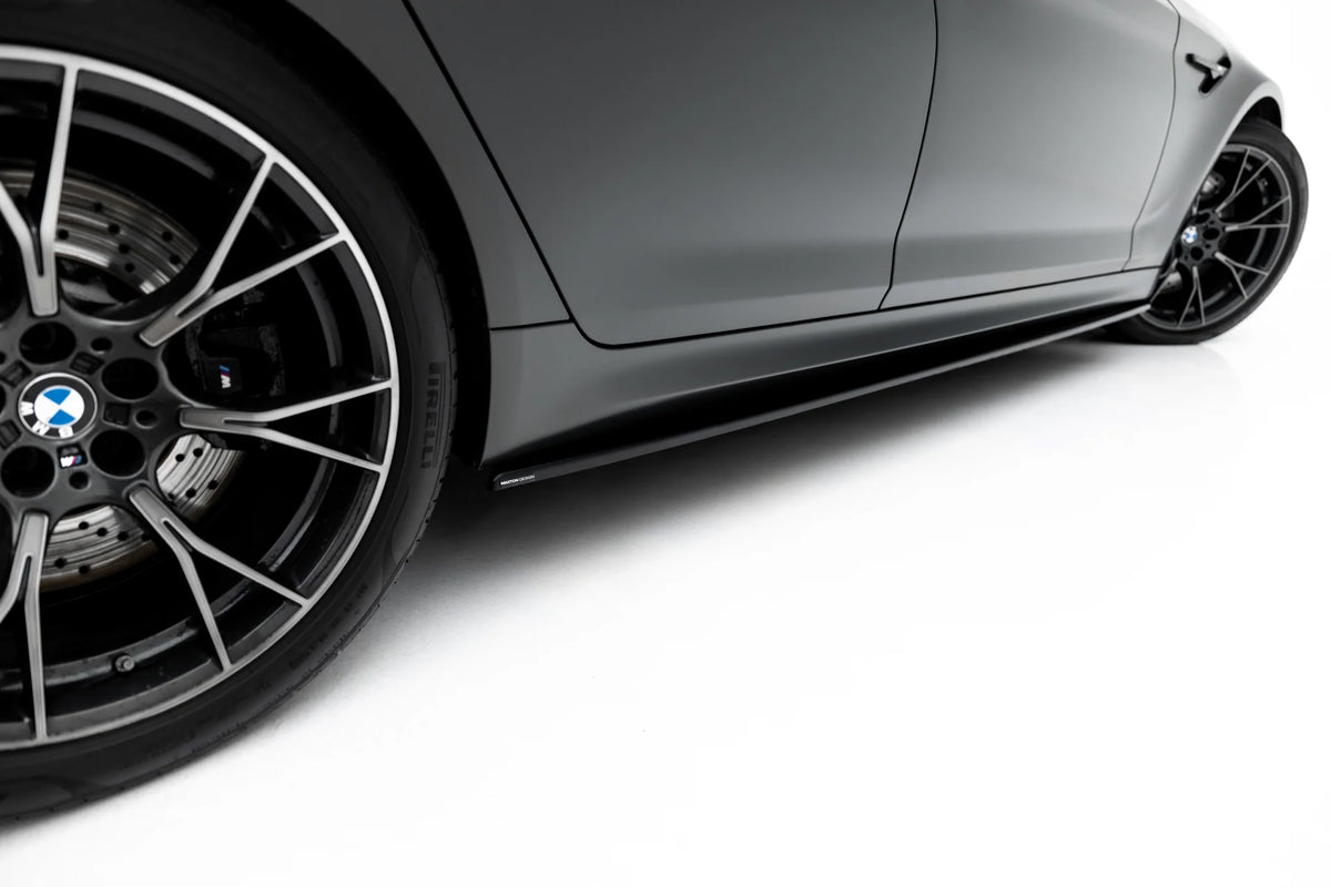 Detaljbilde av splittersett i blank sort til BMW M5 F90