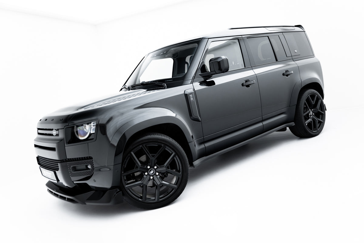 Nærbilde av sideskjørt-diffuser for Defender 110 med strukturert svart overflate