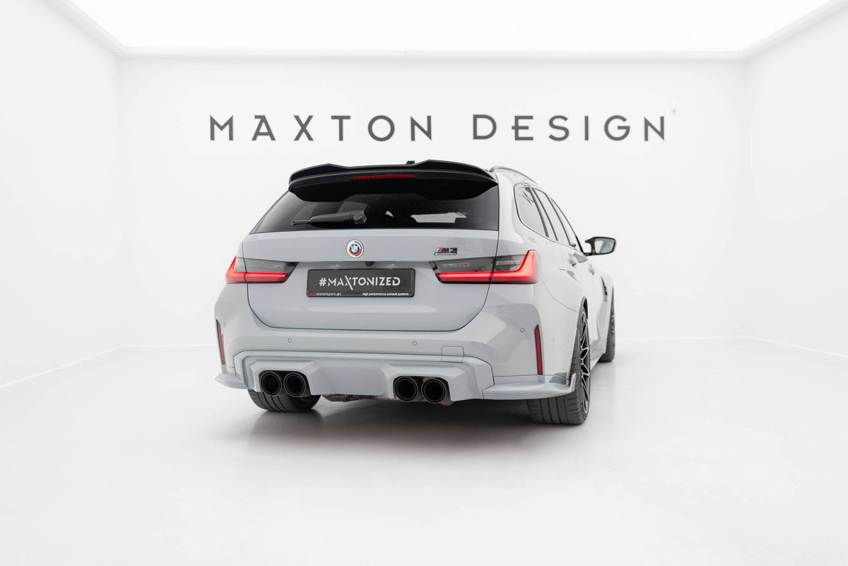 Nærbilde av spoiler cap i blank svart ABS-plast for BMW M3 Touring G81