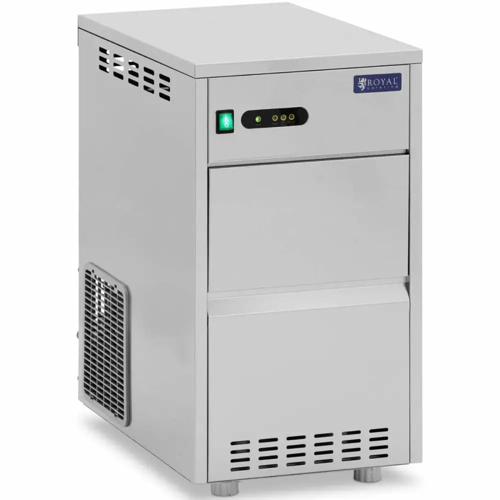Profesjonell ismaskin i rustfritt stål, skrå forfra, med indikatorlamper, grønn strømbryter og ventilasjonsrister.