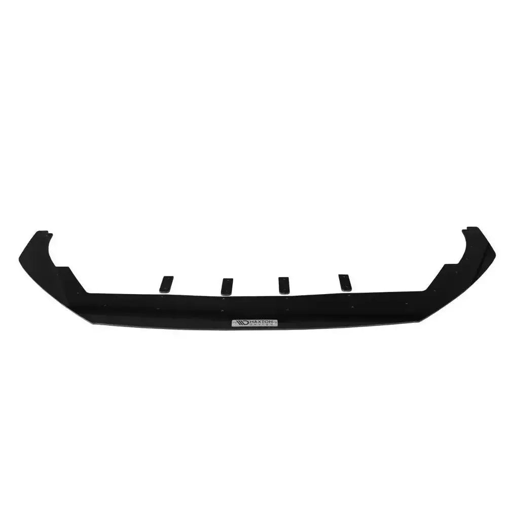 Front lip til Ford Focus ST / St-Line MK4, svart plast med fire fester og logoetikett foran.