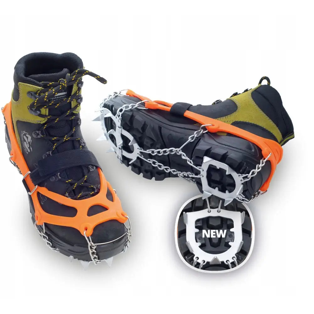 Veriga Mount Track brodder størrelse L, sett skrått med oransje silikon, metallkjeder og stålspisser under sålen.