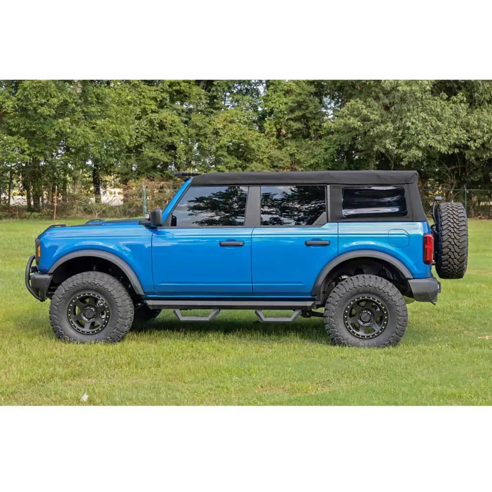 Repositioning av Reservehjulholder med Klaffforsterkning - Ford New Bronco 4 d 21-