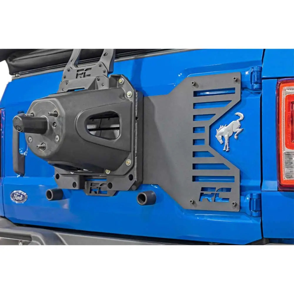 Repositioning av Reservehjulholder med Klaffforsterkning - Ford New Bronco 4 d 21-