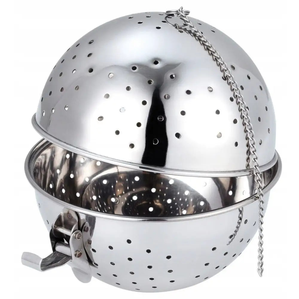 Riskokerinnlegg i blankt rustfritt stål, skråvisning med hullmønster, klemme og lang metallkjede.