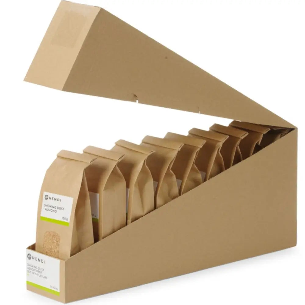 Røkelse pulversett for kaldrøyking, ni papirposer i åpen trekantet eske fotografert fra skrå vinkel.