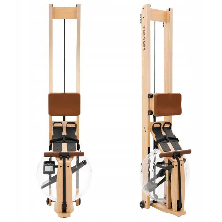 Romaskin i lyst treverk med brune puter, stående på høykant, synlig vanntank og sorte reimer nederst.