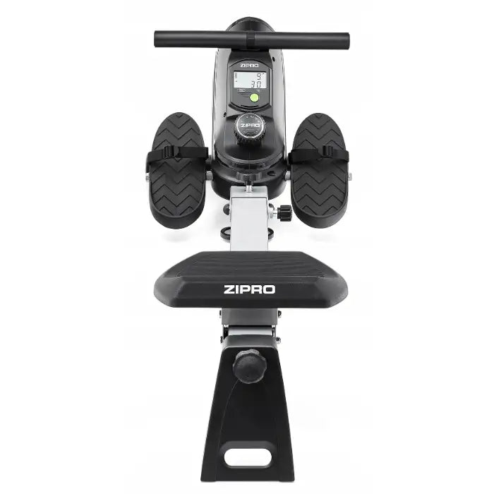 Romaskin Ergometer Sammenleggbar, toppvinkel som fremhever fotpedaler med reimer, digital skjerm og ZIPRO-logo.