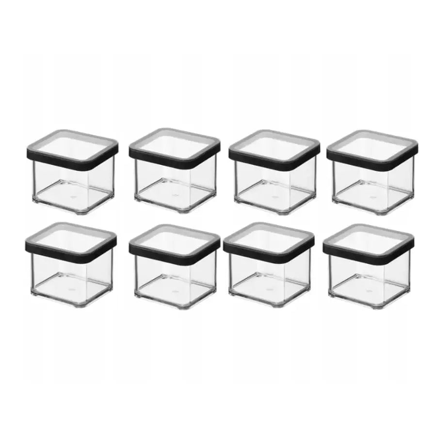 Rotho Loft matbokssett med åtte firkantede plastbokser, sorte lokk, arrangert i to rader mot hvit bakgrunn.