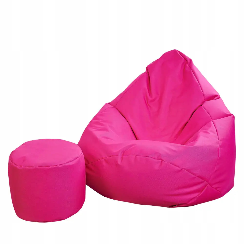 Sacco-sekk Puff XXL i rosa tekstil med rund puff, sett forfra mot høyre, viser myk strukturert overflate.