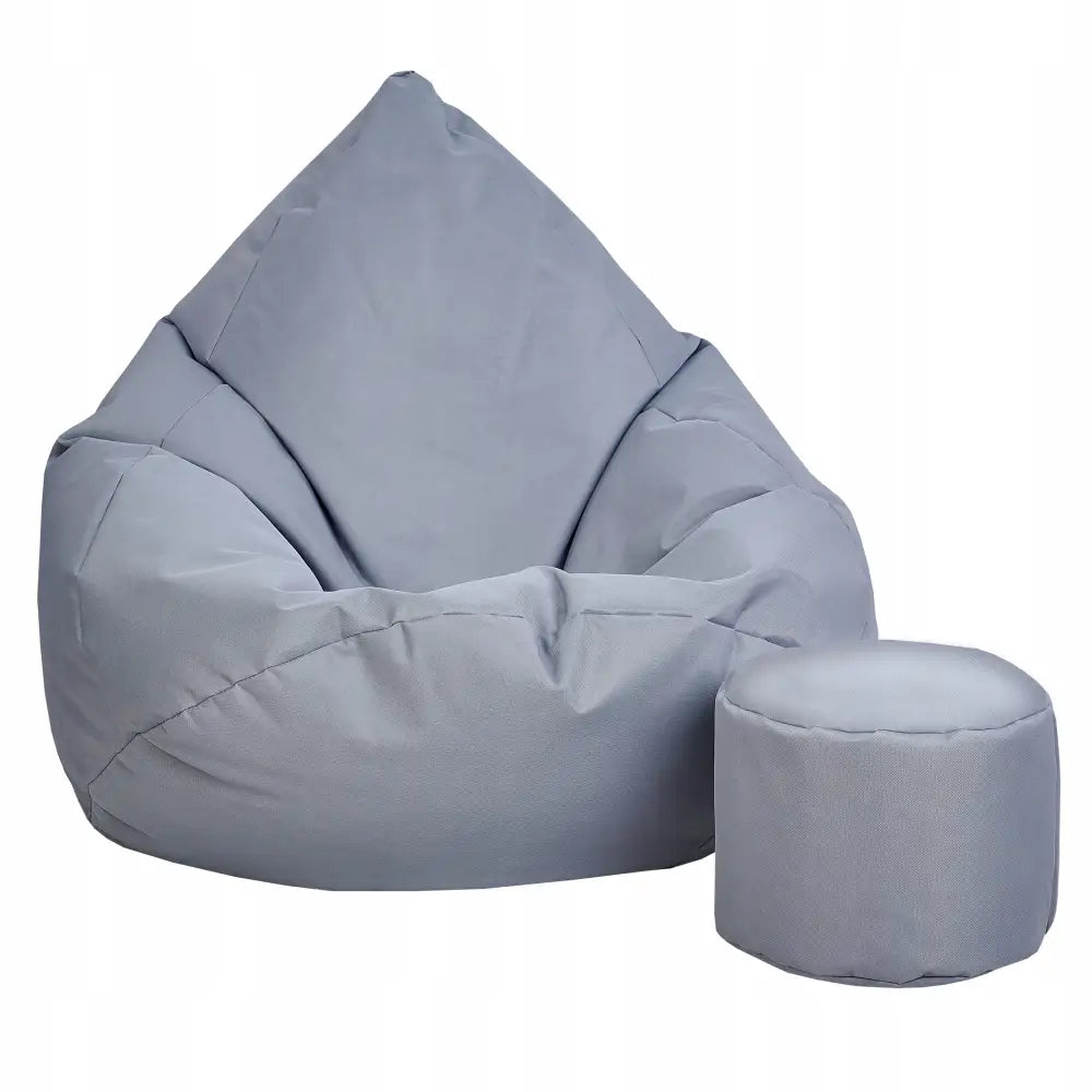 Sako-sekk Oxford XXXXL i lysegrå tekstil med tilhørende rund puff, sett skrått forfra mot lys bakgrunn.