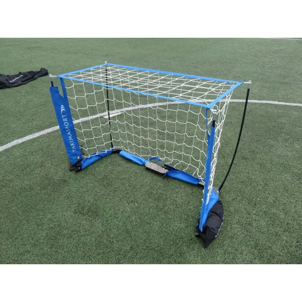 Sammenleggbar port UNI, vist sammenfoldet med fokus på solide hengsler og kompakt design.