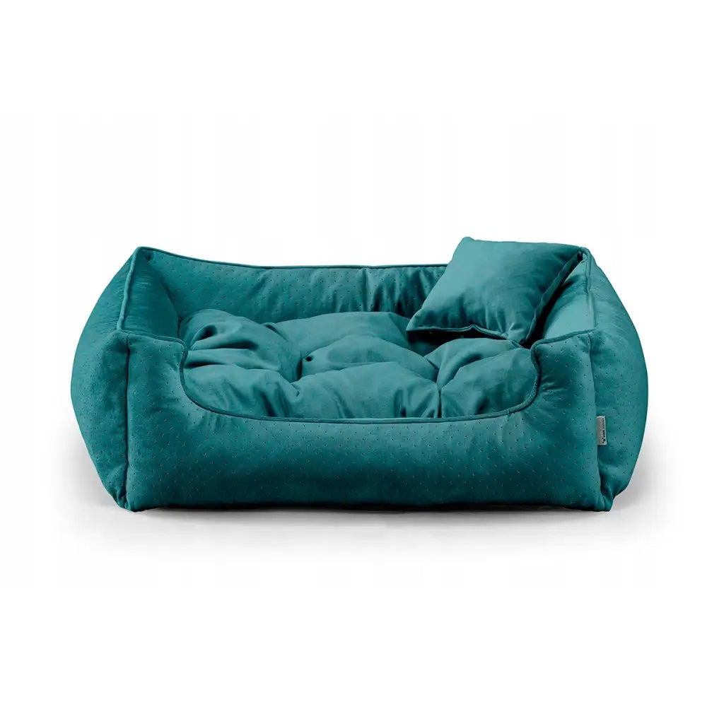 Sengekant Sofa Leketun for hund og katt i turkis med putetopp og prikkete tekstil, sett forfra.