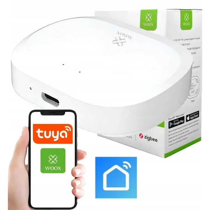 Sentralstyringsenhet Zigbee 30 med hvit oval form, mobilapp i bruk og original emballasje synlig bak.