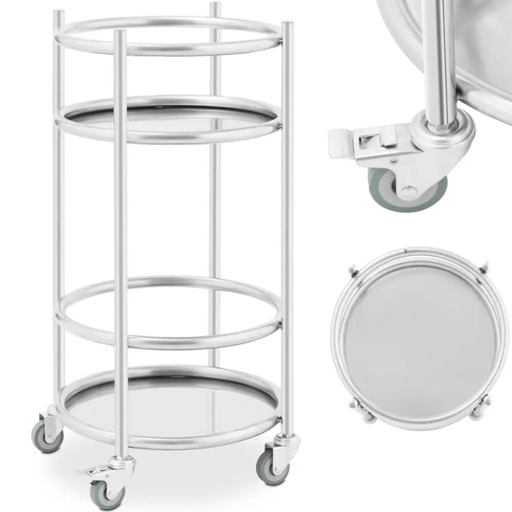 Serveringsvogn for drinker i blankt stål, rund med tre hyller og synlige grå hjul med brems, sett fra siden.
