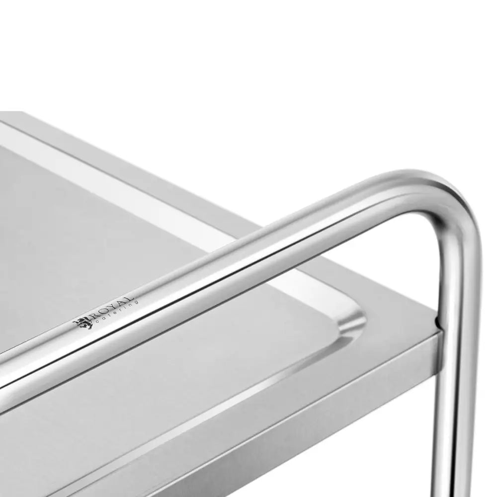 Serveringsvogn HoReCa, nærbilde av avrundet stålhjørne med gravert logo og børstet overflate.