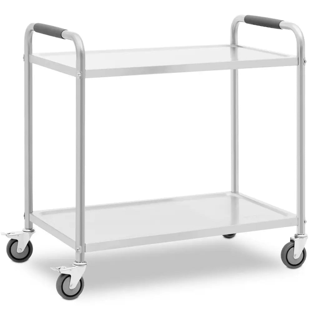 Serveringsvogn i rustfritt stål med to hyller og sorte håndtak, sett skrått forfra mot hvit bakgrunn.