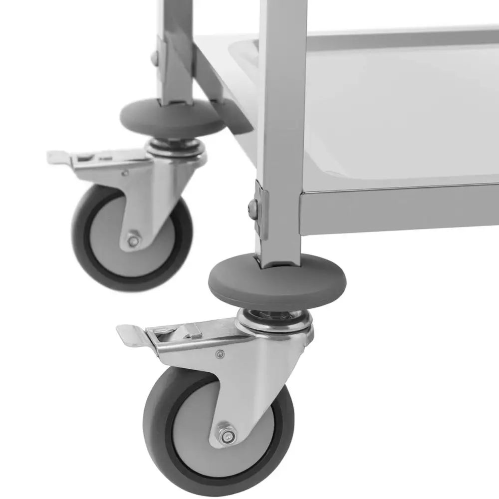 Serveringsvognhjul med grått gummibelegg, metallfeste, brem og støtdemper, detaljvisning fra siden.