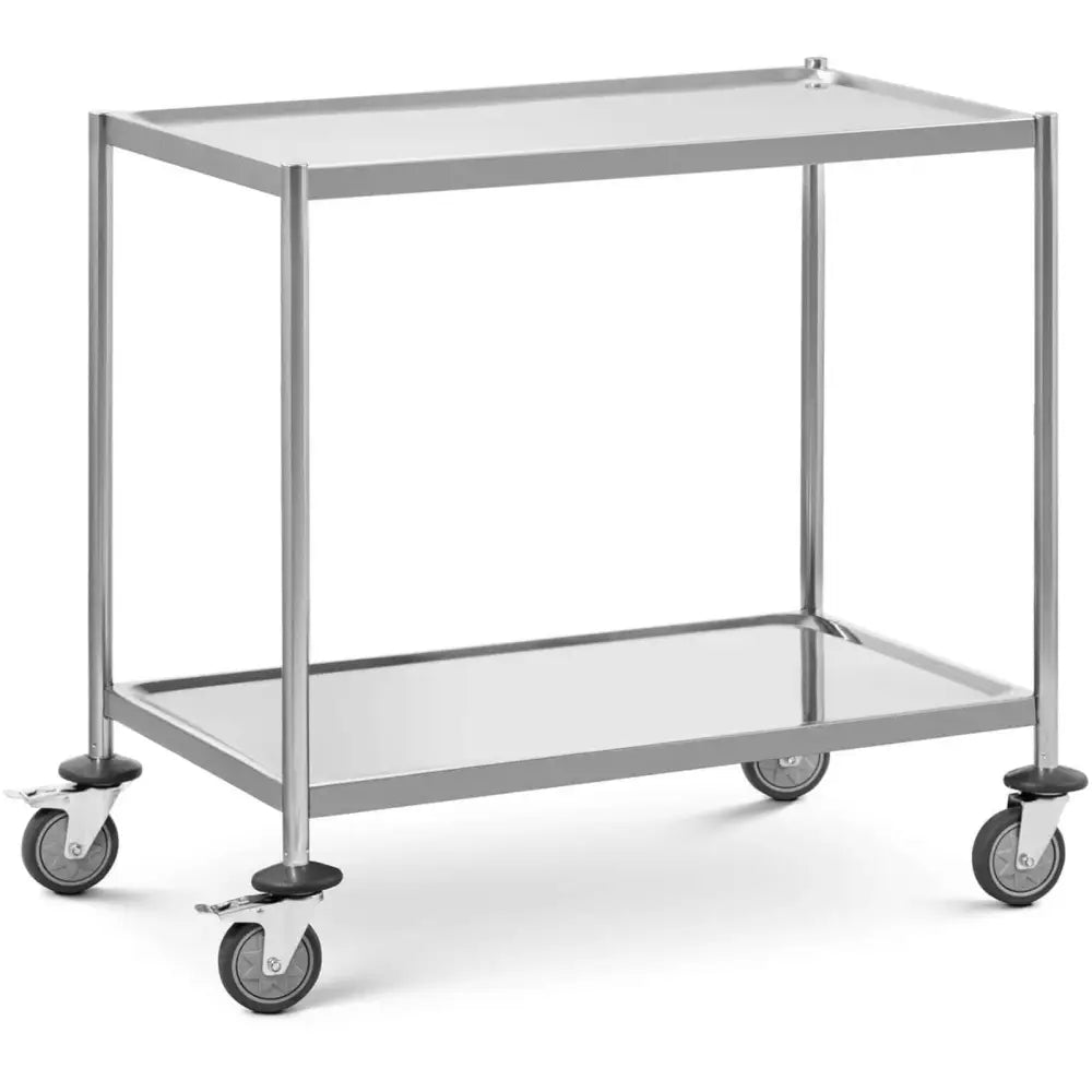 Serveringsvogn i rustfritt stål med to hyller og fire hjul, vist fra skrå vinkel mot hvit bakgrunn.