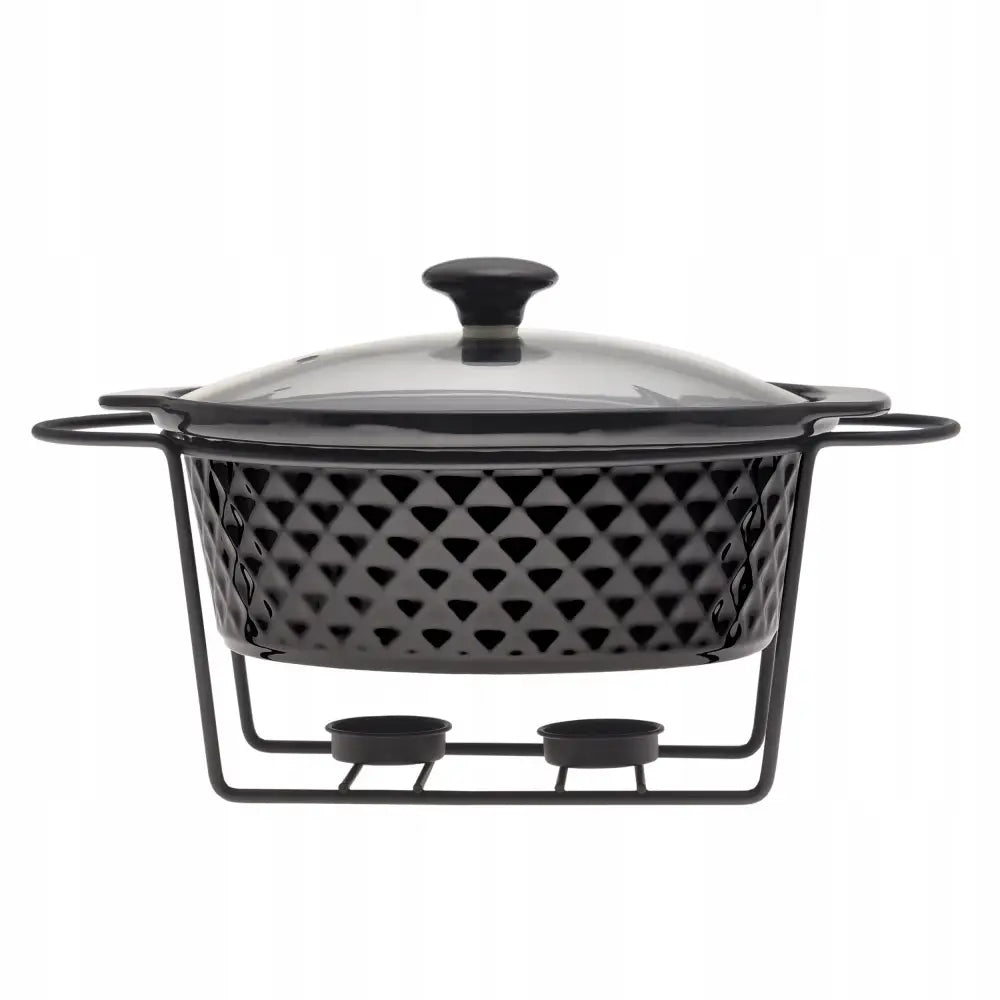 Servise med varmeholder, sort diamantmønstret form på metallstativ for telys, glasslokk med sort håndtak.