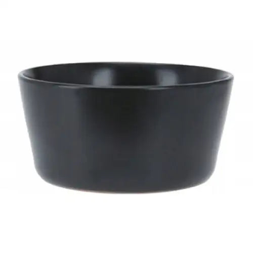 Svart keramikkskål med matt overflate og minimalistisk design, vist rett forfra mot nøytral bakgrunn.