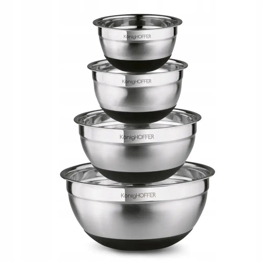 Sett med kjøkkenboller i rustfritt stål, fire sølvfargede boller stablet med sorte bunner og matt finish.