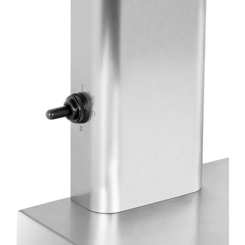 Shaker mikser, nærbilde av børstet ståloverflate med svart vippebryter og tre markerte innstillinger.