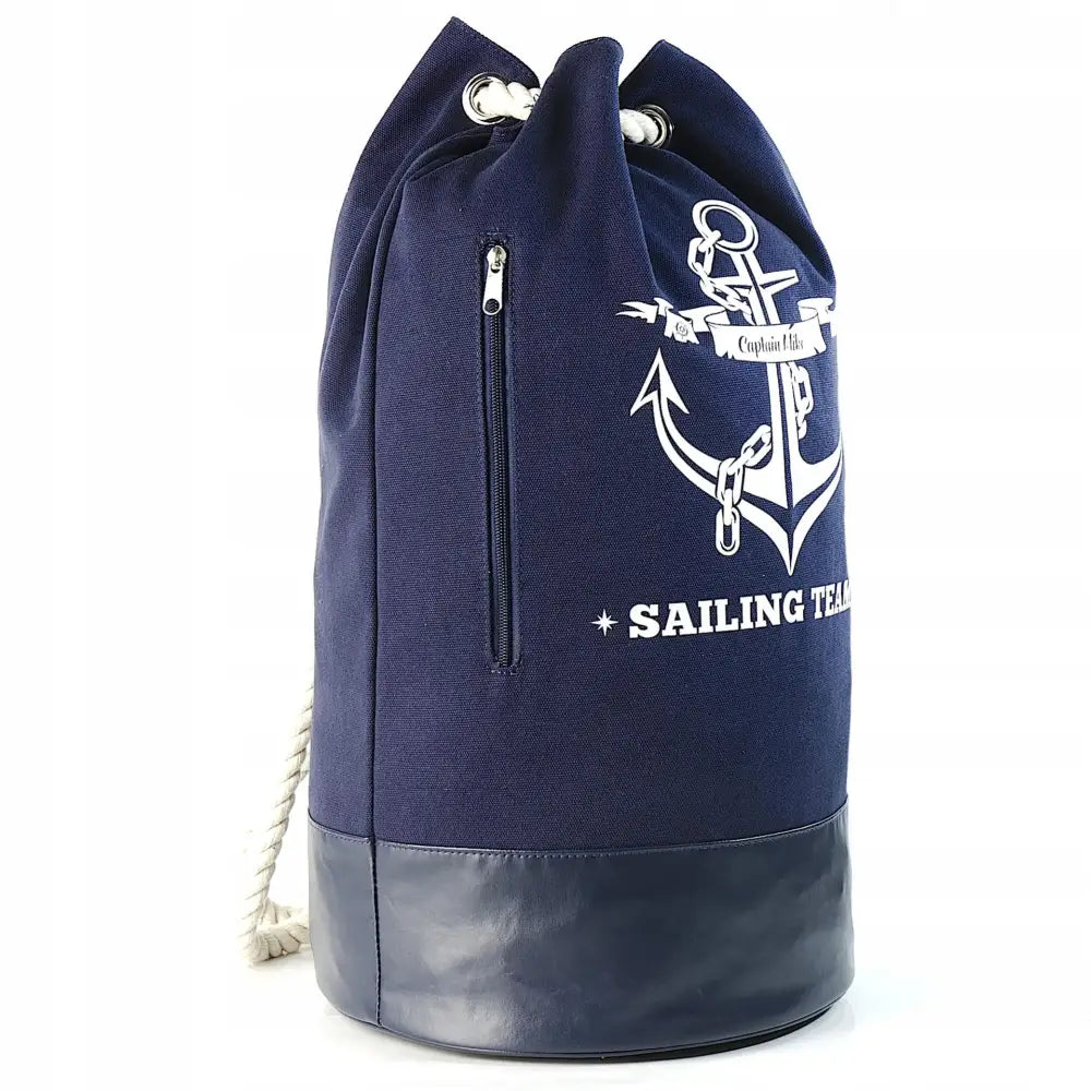 Sjømannssekk Captain Mike stor, mørkeblå med hvitt anker, tauhåndtak og imitert skinnbunn, sett fra siden.