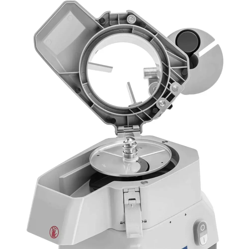 Skiver kutter for grønnsaker, skråvisning med åpent lokk, synlig innmat og markert låsemekanisme.