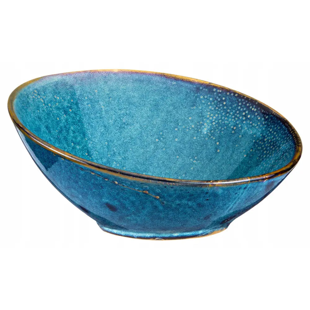 Skrå Misa keramikkbolle 600 ml, dyp blå glasur med brun kant og lyse prikker innvendig, sett skrått.