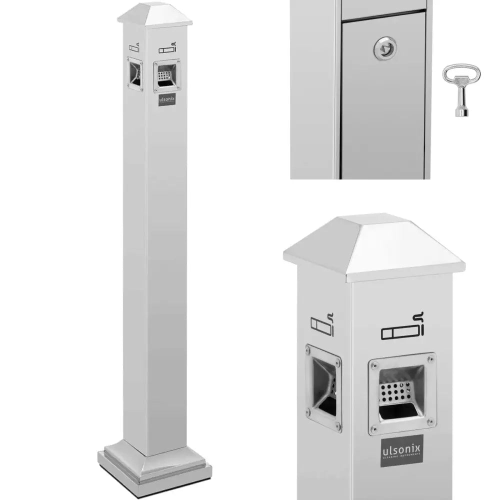 Sølvfarget stående askebeger i metall med låsbar luke, nøkkel og sigarettsymbol på toppen.