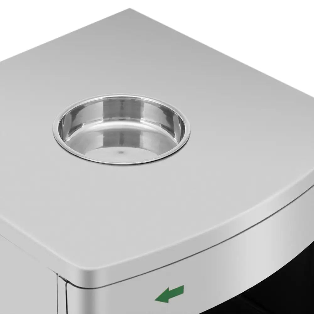 Søppelbøtte i sølvfarget stål med askebeger, detaljert oversiktsbilde av toppen med grønn pil.