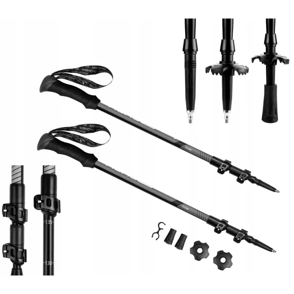 Spokey Zion vandrestaver i svart aluminium, sidevisning med ergonomiske håndtak og diverse utskiftbare tupper.