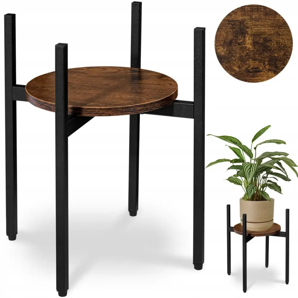 Stående Loft Blomsterstativ Torre Rustic, rundt mørkebrunt trebord med svarte metallben og grønn plantepotte.