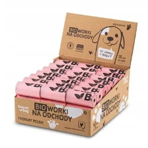 Starchbag komposterbare poser, rosa ruller i åpen pappeske med hundemotiv og svart trykk, frontvisning.