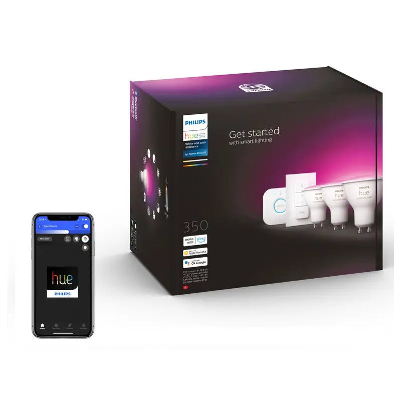 Startpakke Philips Hue med tre GU10 lyspærer, trådløs bryter og app-styring, vist i fargerik eske fra siden.