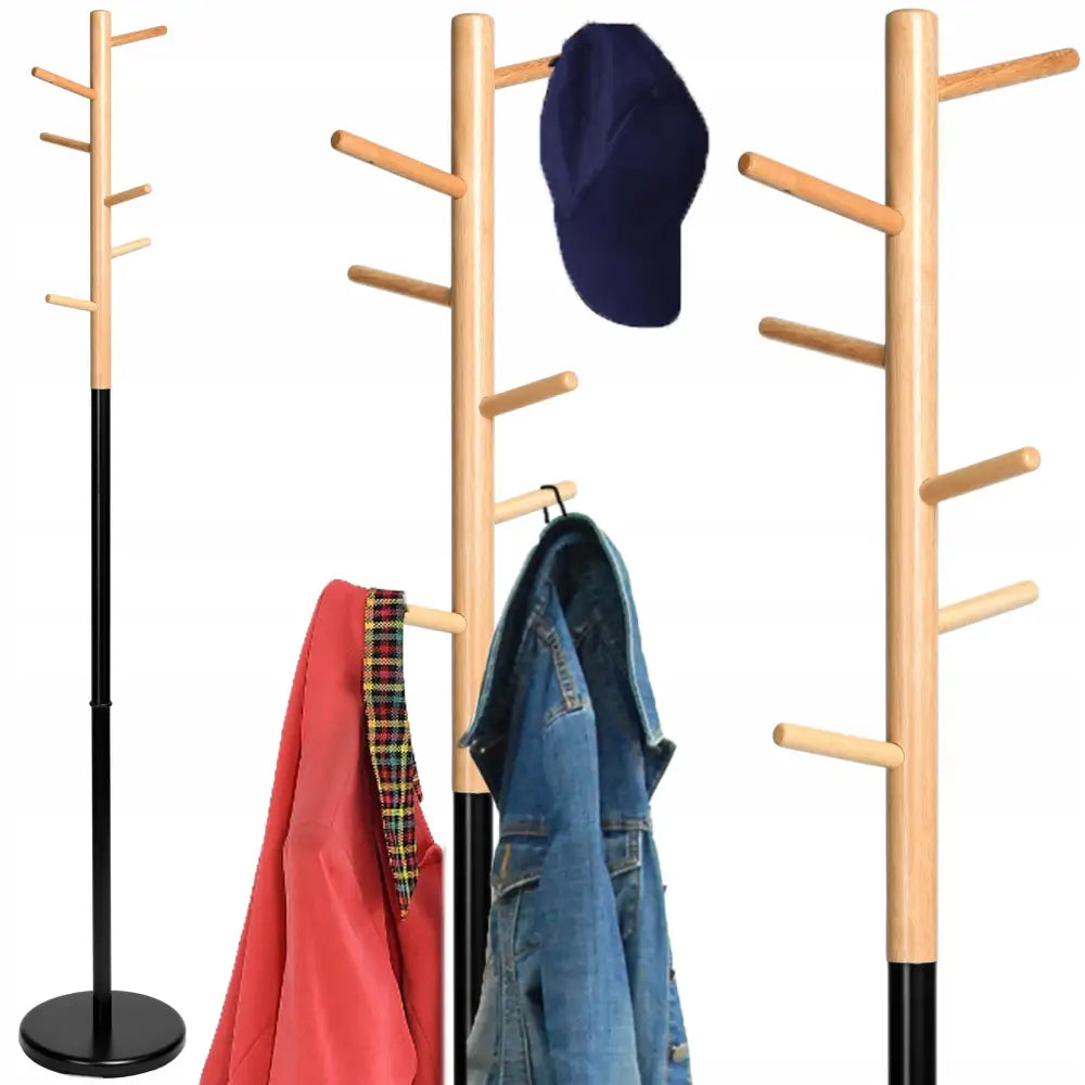 Stativhenger for klær og jakker i loftstil, sidevisning med jakke og caps på armer i lyst tre og sort metall.