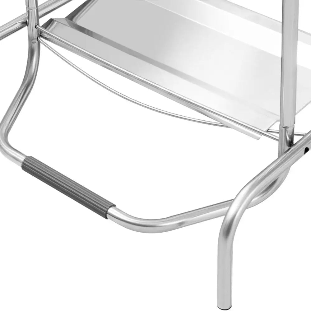 Stativramme til søppelsekk, nærbilde av blankt stål med avrundede bein og rillet grått håndtak på tverrstaget.