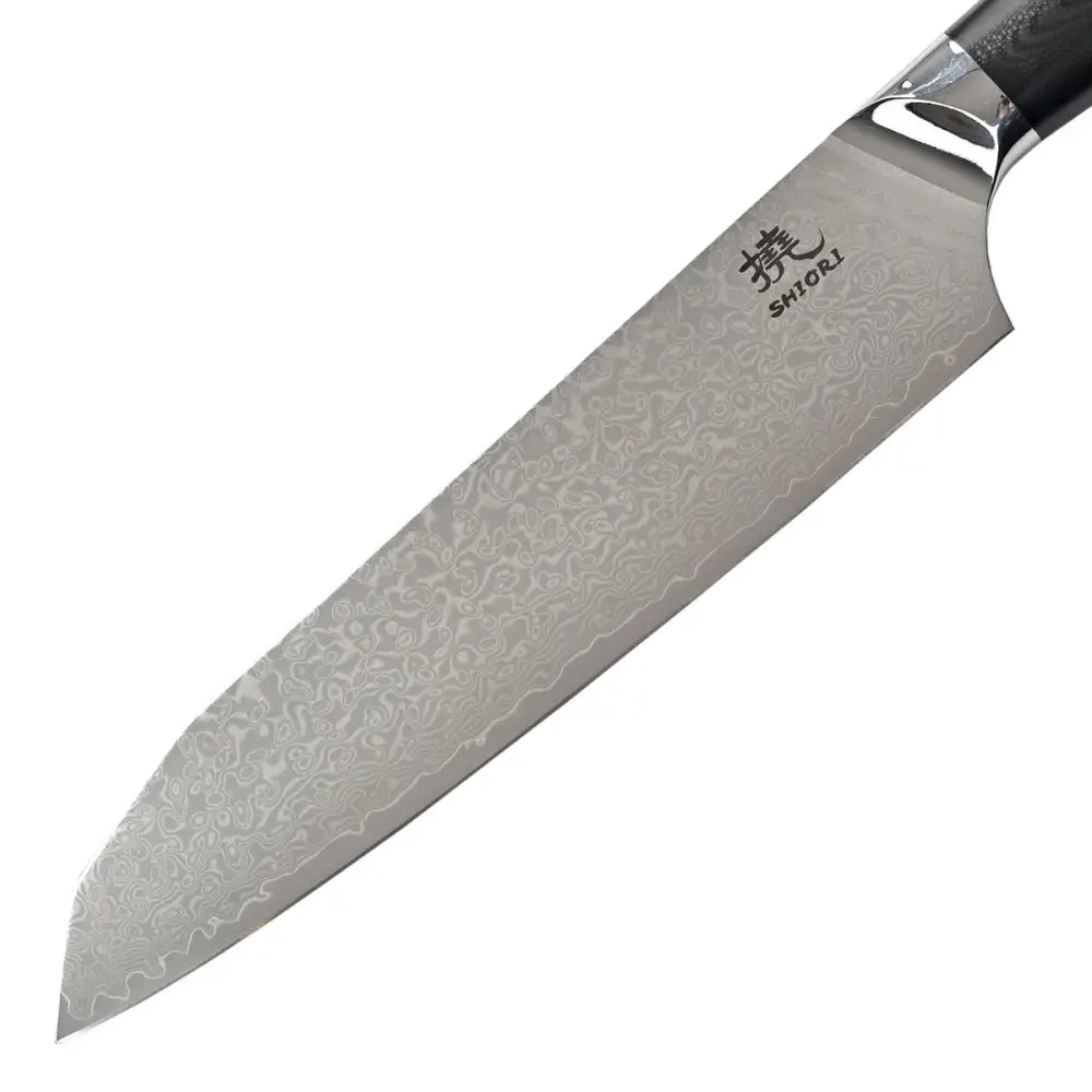 Santoku-kniv i damaskusstål, sideprofil som fremhever det bølgende stålmønsteret og håndtakets detaljer.